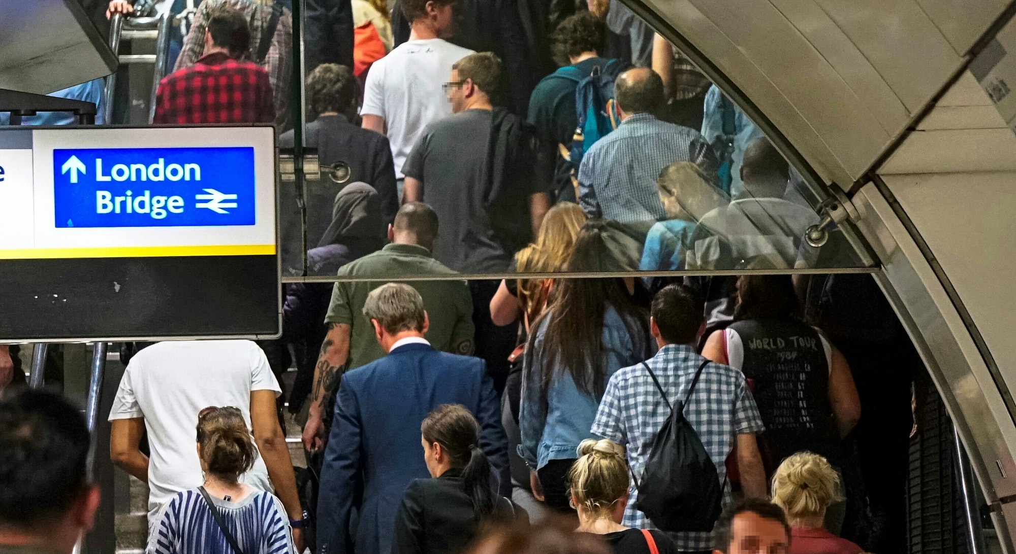 Busy train station. People from back. City. London Bridge station. London Underground. Rush hour