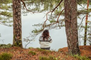 Mindful woman at lake