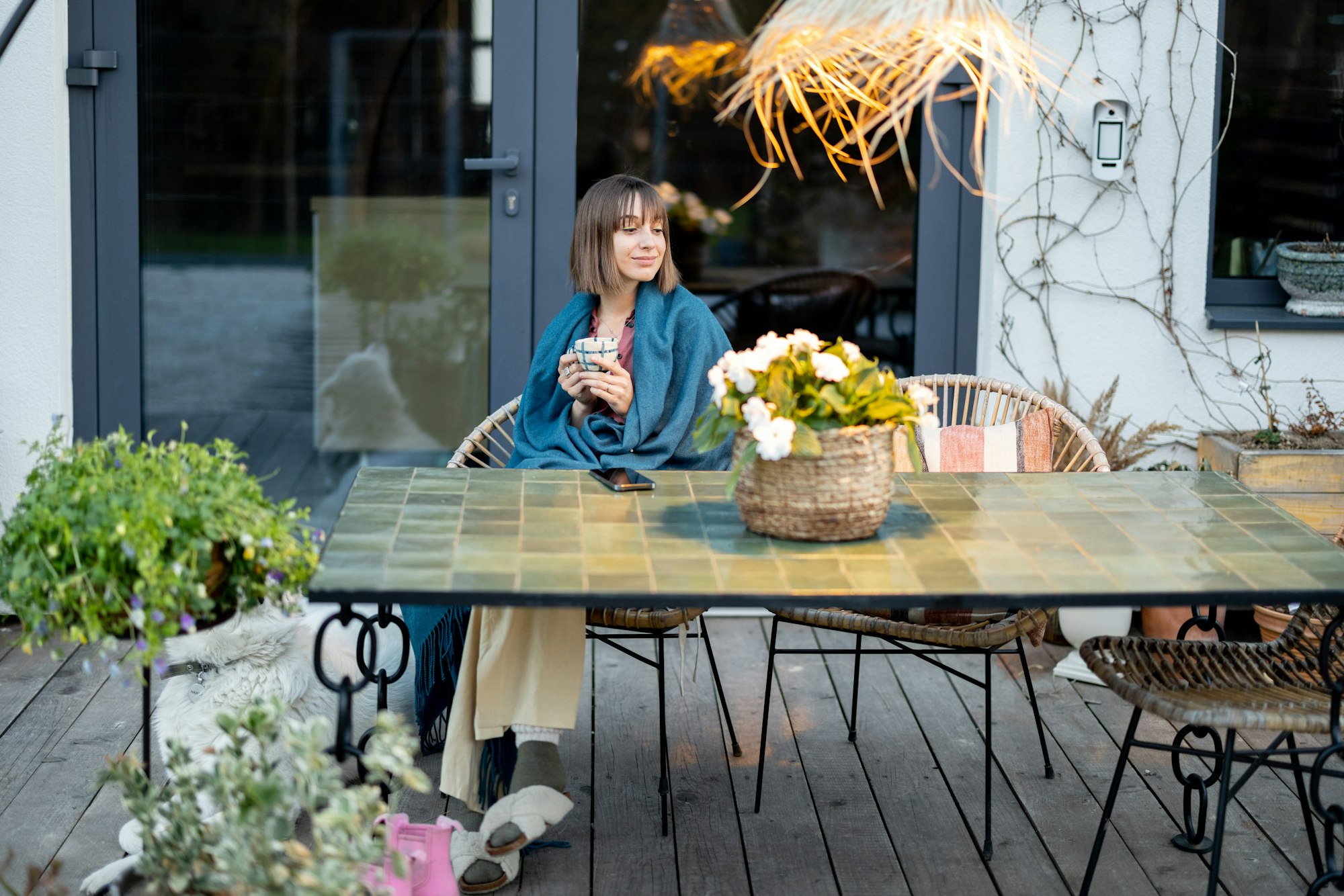 Woman relaxing at home terrace