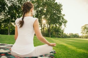 Woman meditating outdoor