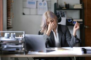 Asian business woman is stressful. bored at work and thinking a lot from unsuccessful work