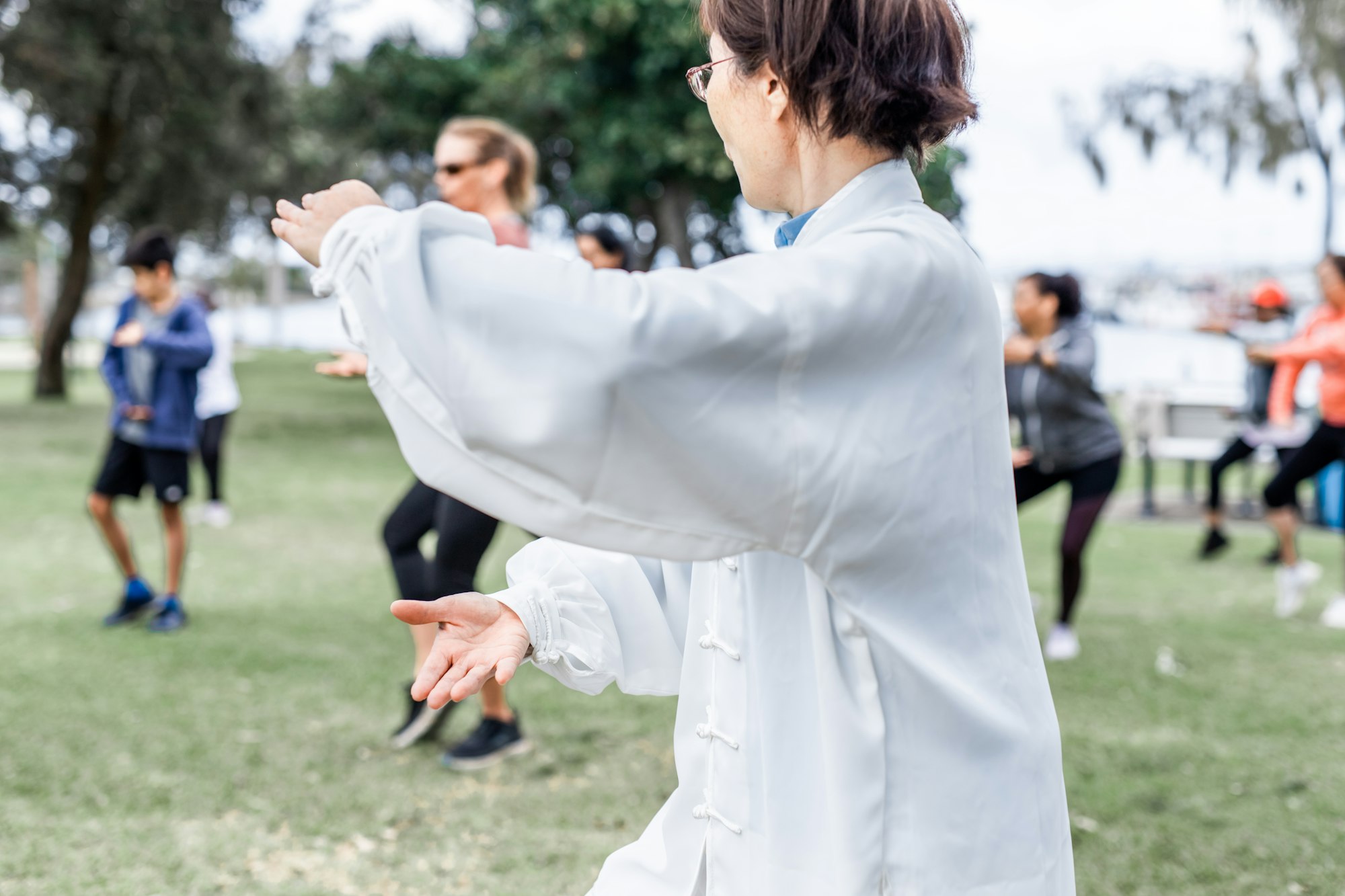 Mature chinese woman do tai chi outdoor