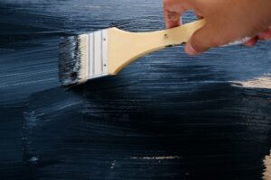 Paint black color on wooden board